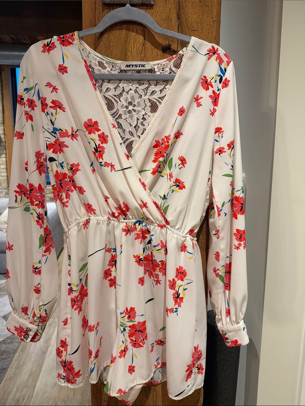 Mystic Cream Long-Sleeve Floral Wrap Romper with Lace Back